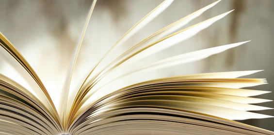 Composition with hardcover book on the table